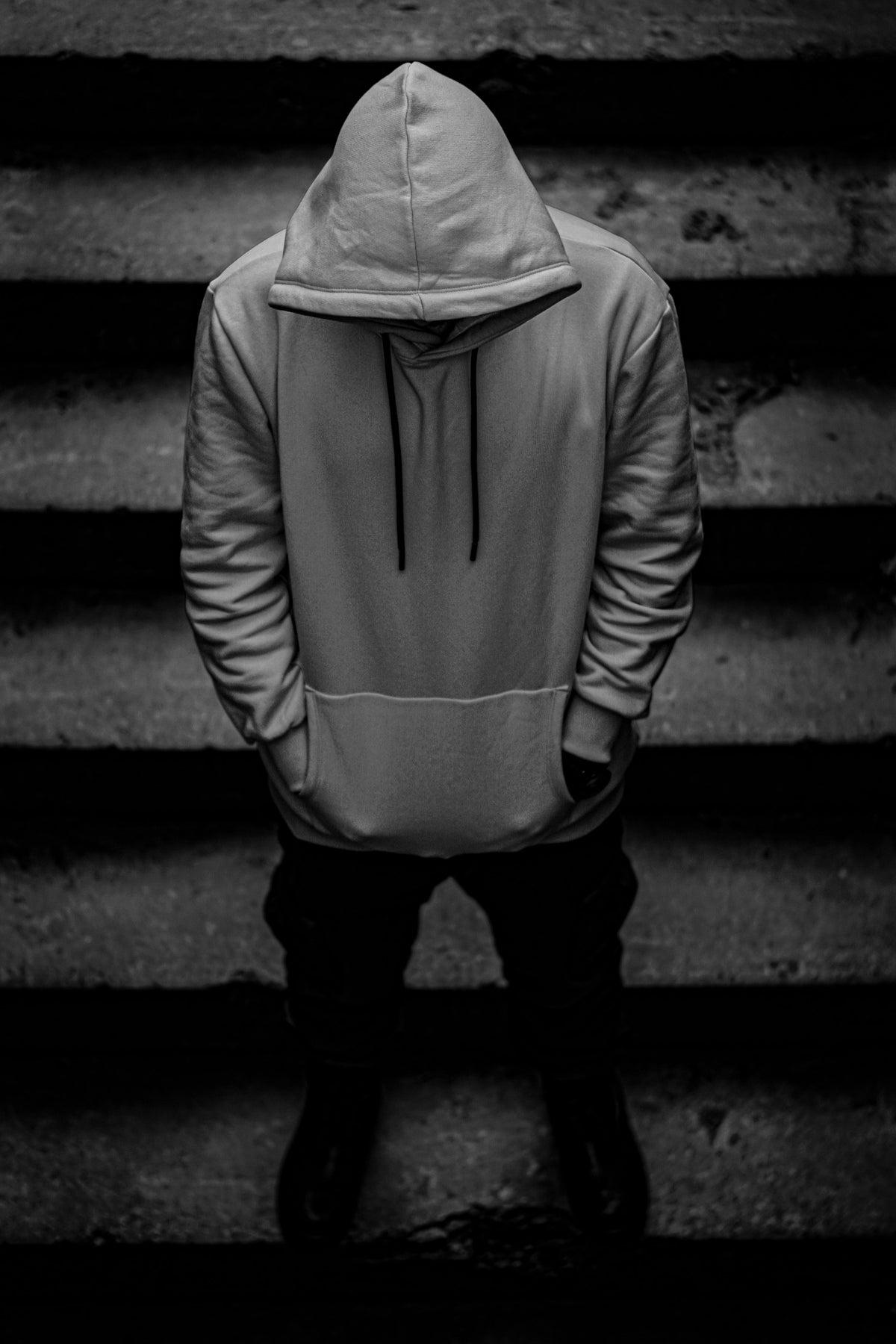 back view of an oversized hoodie on stairs